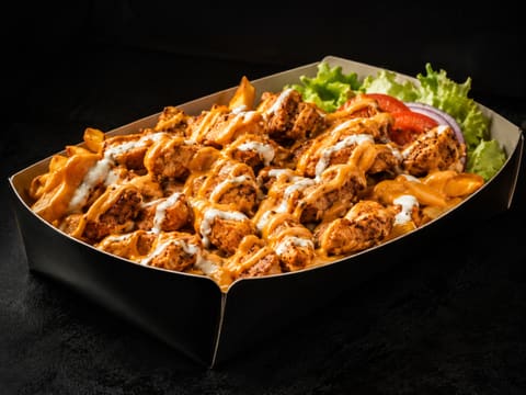 Box Masala : poulet tikka nappé de sauce masala, servi en box